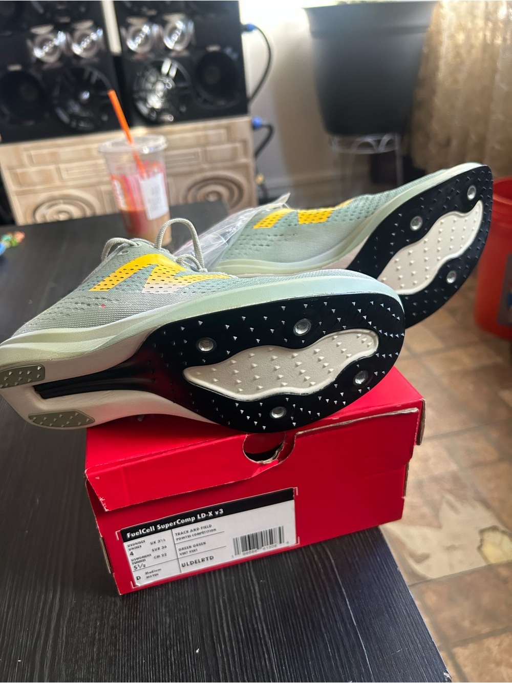 New Balance mint green and yellow racing spikes